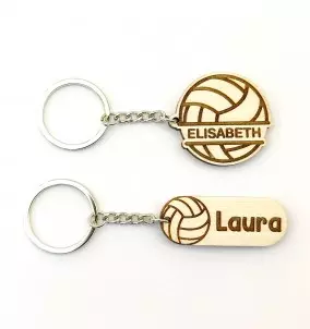 Personalized Volleyball keychain with an engraved name of your choice. 2 designs are available. Gift for volleyball players.