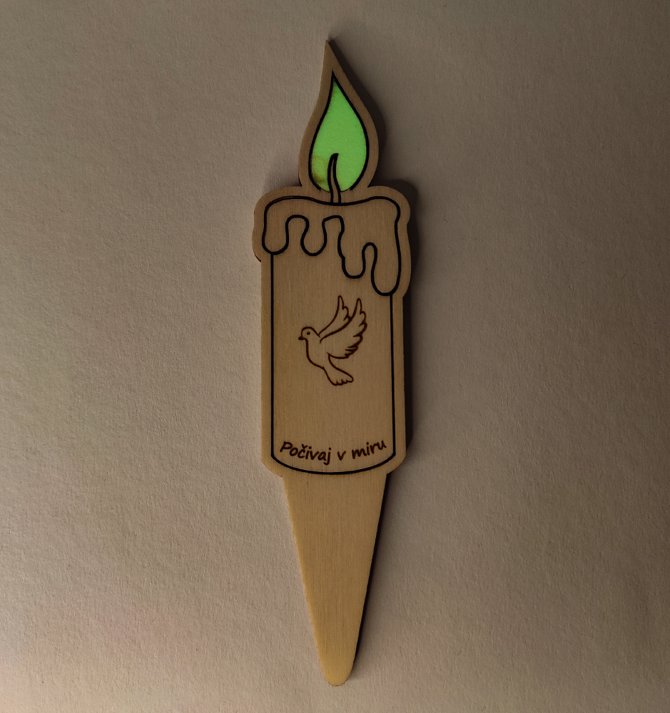 Wooden candle with luminous flame and custom inscription.